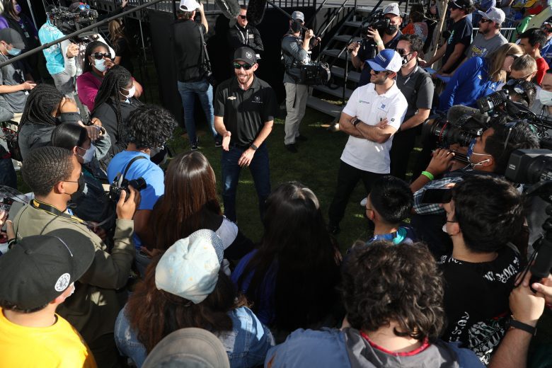 LOS ANGELES, CALIFORNIA - FEBRUARY 05: Boys & Girls Clubs of Carson kids receiving a tour around the track, which includes touring through the garage area and track walk. Kids interacting with a Cup driver during the tour. at Los Angeles Memorial Coliseum on February 05, 2022 in Los Angeles, California. (Photo by Meg Oliphant/Getty Images)