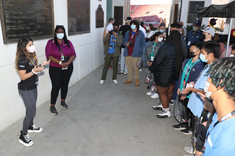 LOS ANGELES, CALIFORNIA - FEBRUARY 05: Boys & Girls Clubs of Carson kids receiving a tour around the track, which includes touring through the garage area and track walk. Kids interacting with a Cup driver during the tour. at Los Angeles Memorial Coliseum on February 05, 2022 in Los Angeles, California. (Photo by Meg Oliphant/Getty Images)