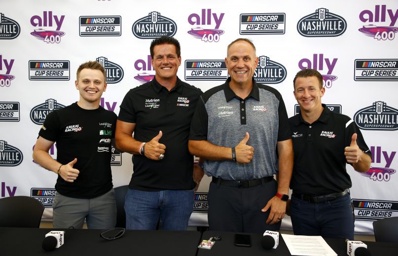 LEBANON, TENNESSEE - JUNE 18: (L-R) Justin Haley, driver of the #11 LeafFilter Gutter Protection Chevrolet, Matt Kaulig, owner of Kaulig Racing, Chris Rice, president of Kaulig Racing and AJ Allmendinger, driver of the #16 Hyperice Chevrolet pose for photos after the announcement that Kaulig Racing will race full time in the NASCAR Cup Series season in 2022, during a press conference prior to practice for the NASCAR Xfinity Series Tennessee Lottery 250 at Nashville Superspeedway on June 18, 2021 in Lebanon, Tennessee. (Photo by Jared C. Tilton/Getty Images) | Getty Images
