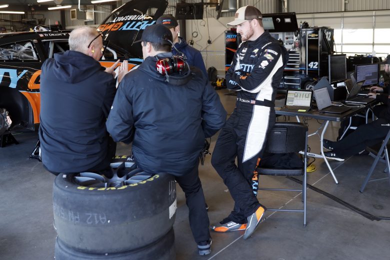 AVONDALE, ARIZONA - JANUARY 25: Ty Dillon driver of the #42 GMS Racing Chevrolet talks with crewmembers during the NASCAR Next Gen Test at Phoenix Raceway on January 25, 2022 in Avondale, Arizona. (Photo by Chris Coduto/Getty Images) | Getty Images