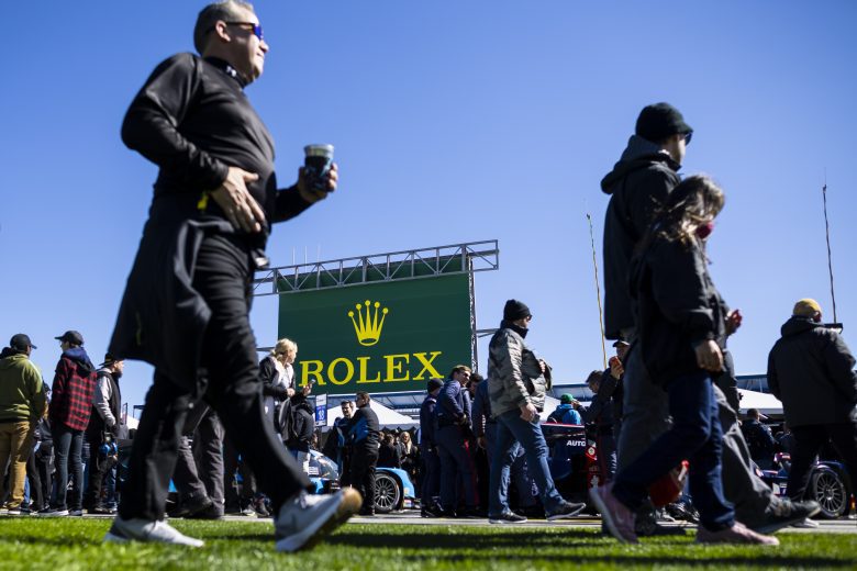 DAYTONA BEACH, FLORIDA - JANUARY 29: Fans walk on pit lane during prerace festivities before the start of the Rolex 24 at Daytona International Speedway on January 29, 2022 in Daytona Beach, Florida. (Photo by James Gilbert/Getty Images) | Getty Images
