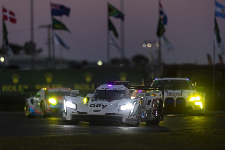 DAYTONA BEACH, FLORIDA - JANUARY 29: The #48 Ally Cadillac Racing Cadillac DPi of Jimmie Johnson, Kamui Kobayashi, Jose Maria Lopez, and Mike Rockenfeller drives during the Rolex 24 at Daytona International Speedway on January 29, 2022 in Daytona Beach, Florida. (Photo by James Gilbert/Getty Images) | Getty Images