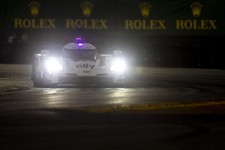 DAYTONA BEACH, FLORIDA - JANUARY 29: The #48 Ally Cadillac Racing Cadillac DPi of Jimmie Johnson, Kamui Kobayashi, Jose Maria Lopez, and Mike Rockenfeller drives during the Rolex 24 at Daytona International Speedway on January 29, 2022 in Daytona Beach, Florida. (Photo by James Gilbert/Getty Images) | Getty Images