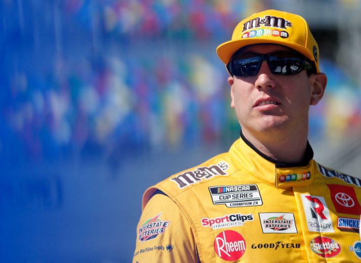 DAYTONA BEACH, FLORIDA - FEBRUARY 09: Kyle Busch, driver of the #18 M&M's Toyota, stands on the grid during qualifying for the NASCAR Cup Series 62nd Annual Daytona 500 at Daytona International Speedway on February 09, 2020 in Daytona Beach, Florida. (Photo by Brian Lawdermilk/Getty Images) | Getty Images