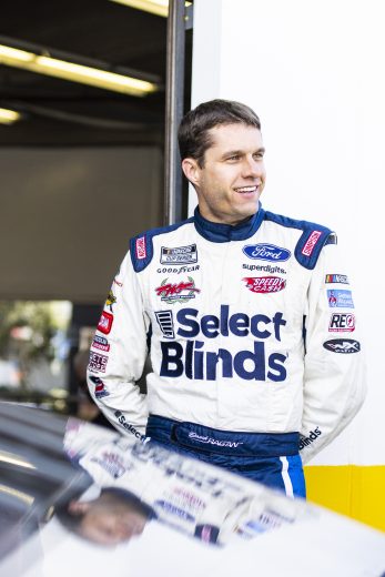 DAYTONA BEACH, FLORIDA - JANUARY 12: David Ragan looks on in the garage during the NASCAR Next Gen Test at Daytona International Speedway on January 12, 2022 in Daytona Beach, Florida. (Photo by James Gilbert/Getty Images) | Getty Images