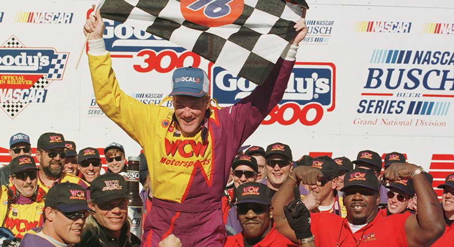 17 Feb 1996: Steve Grissom is hoisted onto the shoulders of wrestlers (L-R) Sting, Lex Luger of team sponsor World Championship Wrestling Racing Team and tag team Harlem Heat after winning the NASCAR Busch Grand National Division Goodys 300 at the Dayto