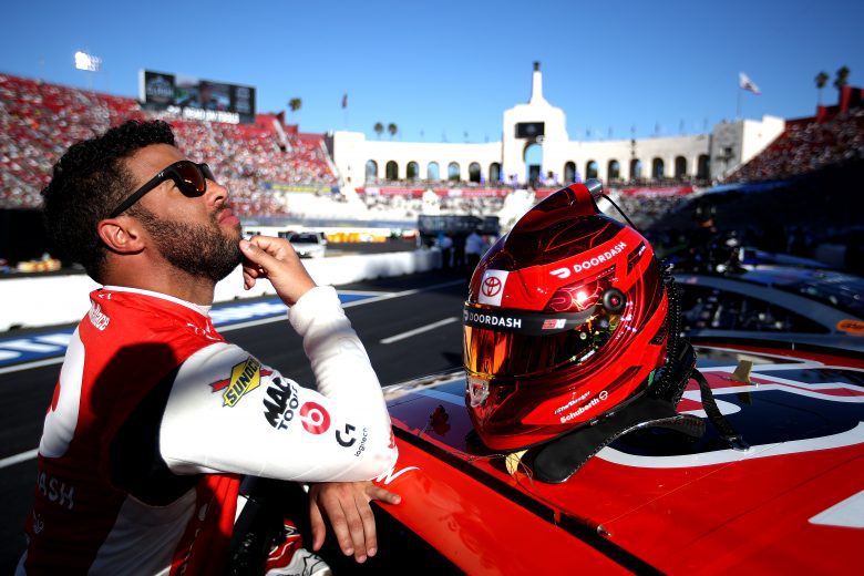 LOS ANGELES, CALIFORNIA - FEBRUARY 06: Bubba Wallace, driver of the #23 DoorDash Toyota, waits on the grid prior to the NASCAR Cup Series Busch Light Clash at the Los Angeles Memorial Coliseum on February 06, 2022 in Los Angeles, California. (Photo by Sean Gardner/Getty Images) | Getty Images