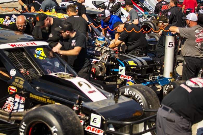 A general view of the garage area during practice for the New Smyrna Visitors Bureau 200 for the NASCAR Whelen Modified Tour during night 2 of the World Series of Asphalt Stock Car Racing at New Smyrna Speedway in New Smyrna, Florida on February 12, 2022. (Adam Glanzman/NASCAR)