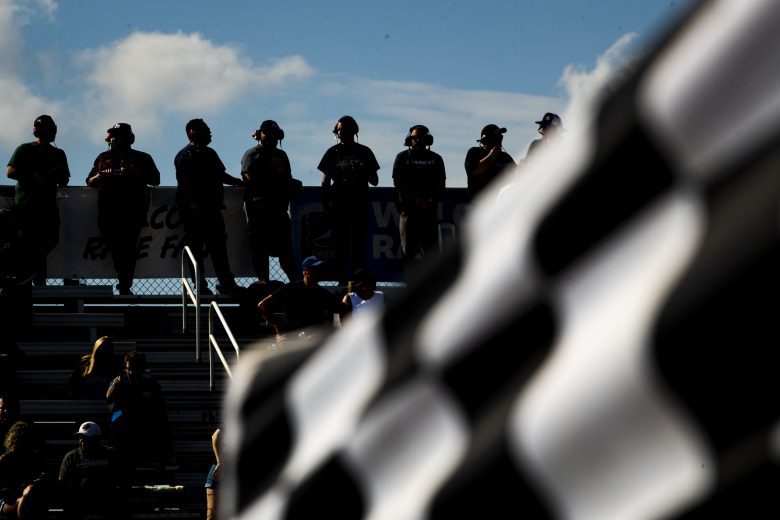 Spotters look on during practice for the New Smyrna Visitors Bureau 200 for the NASCAR Whelen Modified Tour during night 2 of the World Series of Asphalt Stock Car Racing at New Smyrna Speedway in New Smyrna, Florida on February 12, 2022. (Adam Glanzman/NASCAR)