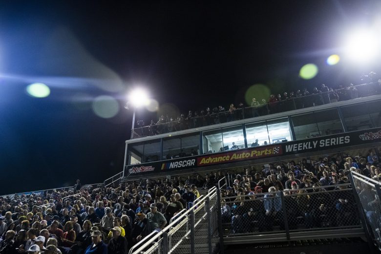 A sold out crowd looks on before the start of the New Smyrna Visitors Bureau 200 for the NASCAR Whelen Modified Tour during night 2 of the World Series of Asphalt Stock Car Racing at New Smyrna Speedway in New Smyrna, Florida on February 12, 2022. (Adam Glanzman/NASCAR)