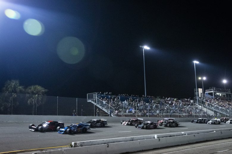 Cars race during the New Smyrna Visitors Bureau 200 for the NASCAR Whelen Modified Tour during night 2 of the World Series of Asphalt Stock Car Racing at New Smyrna Speedway in New Smyrna, Florida on February 12, 2022. (Adam Glanzman/NASCAR)