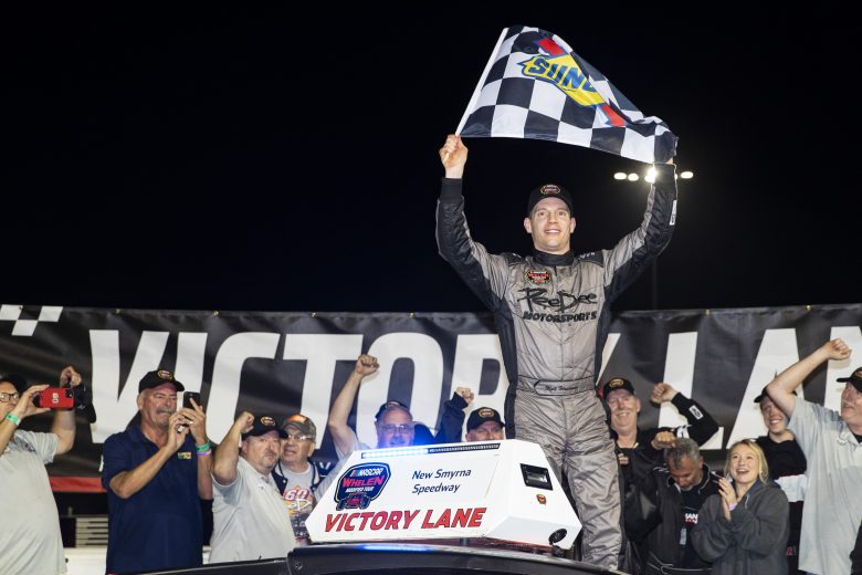 Matt Hirschman, driver of the #60 PeeDee Motorsports Car, celebrates in victory lane during the New Smyrna Visitors Bureau 200 for the NASCAR Whelen Modified Tour during night 2 of the World Series of Asphalt Stock Car Racing at New Smyrna Speedway in New Smyrna, Florida on February 12, 2022. (Adam Glanzman/NASCAR)