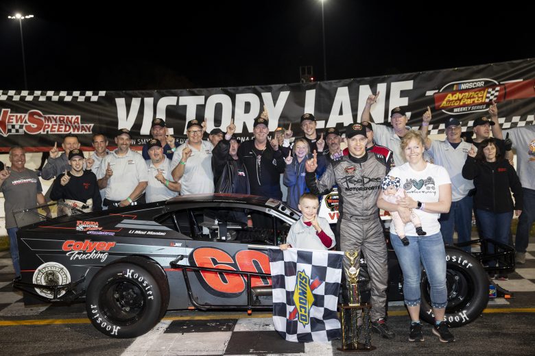Matt Hirschman, driver of the #60 PeeDee Motorsports Car, celebrates in victory lane during the New Smyrna Visitors Bureau 200 for the NASCAR Whelen Modified Tour during night 2 of the World Series of Asphalt Stock Car Racing at New Smyrna Speedway in New Smyrna, Florida on February 12, 2022. (Adam Glanzman/NASCAR)