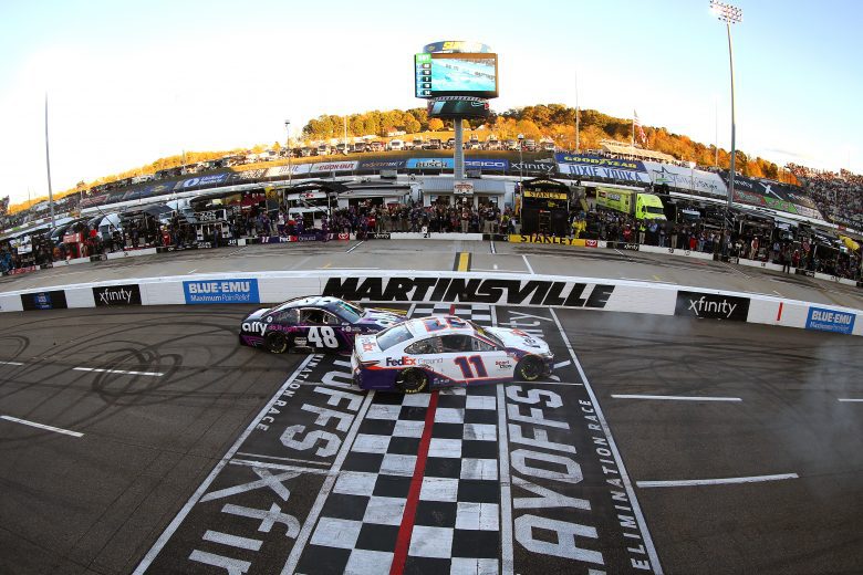 MARTINSVILLE, VIRGINIA - OCTOBER 31: Denny Hamlin, driver of the #11 FedEx Ground Toyota, impedes Alex Bowman, driver of the #48 Ally Chevrolet, celebration after winning the NASCAR Cup Series Xfinity 500 at Martinsville Speedway on October 31, 2021 in Martinsville, Virginia. (Photo by Brian Lawdermilk/Getty Images) | Getty Images