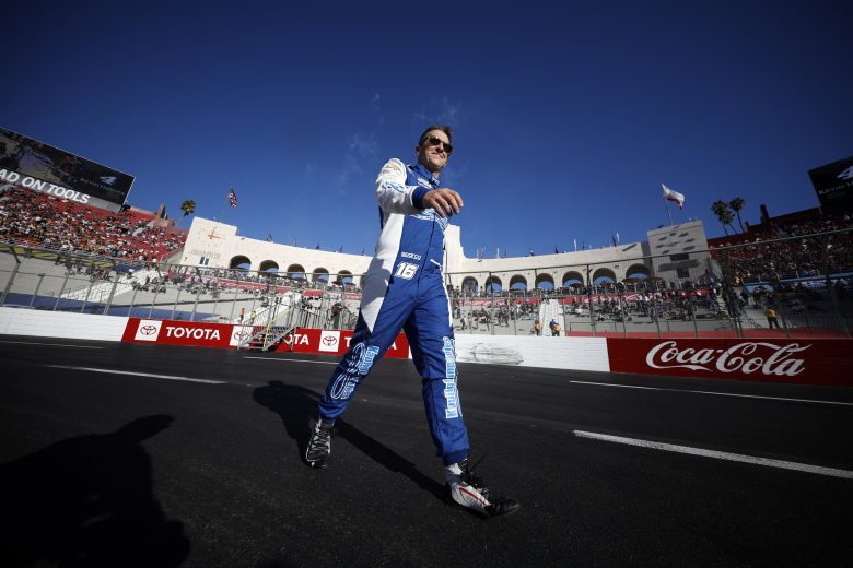 LOS ANGELES, CALIFORNIA - FEBRUARY 06: AJ Allmendinger, driver of the #16 chevyliners.com Chevrolet, walks the track during driver intros prior to the NASCAR Cup Series Busch Light Clash at the Los Angeles Memorial Coliseum on February 06, 2022 in Los Angeles, California. (Photo by Chris Graythen/Getty Images) | Getty Images