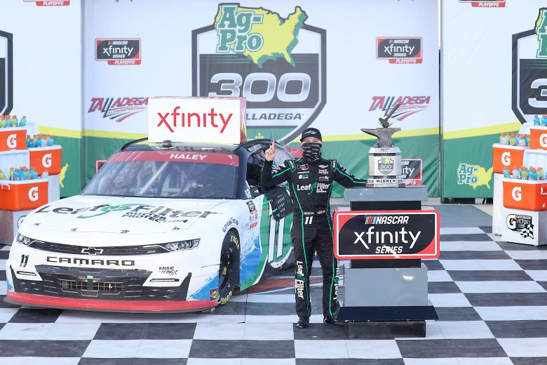 TALLADEGA, ALABAMA - OCTOBER 03: Justin Haley, driver of the #11 LeafFilter Gutter Protection Chevrolet, celebrates in victory lane after winning the NASCAR Xfinity Series Ag-Pro 300 at Talladega Superspeedway on October 03, 2020 in Talladega, Alabama. (Photo by Chris Graythen/Getty Images) | Getty Images
