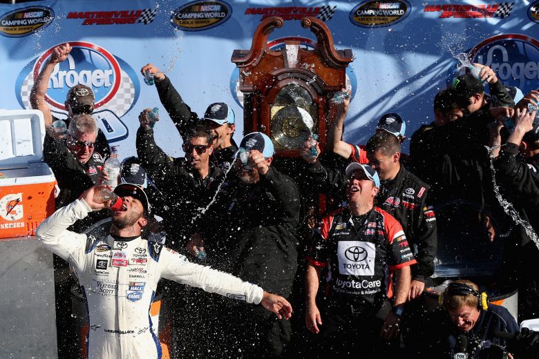 MARTINSVILLE, VA - OCTOBER 25:  Darrell Wallace, Jr., driver of the #34 2015 NASCAR Hall of Fame Inductee Wendell Scott Toyota, celebrates in Victory Lane after winning the NASCAR Camping World Truck Series Kroger 200 at Martinsville Speedway on October 25, 2014 in Martinsville, Virginia.  (Photo by Sarah Glenn/NASCAR via Getty Images)