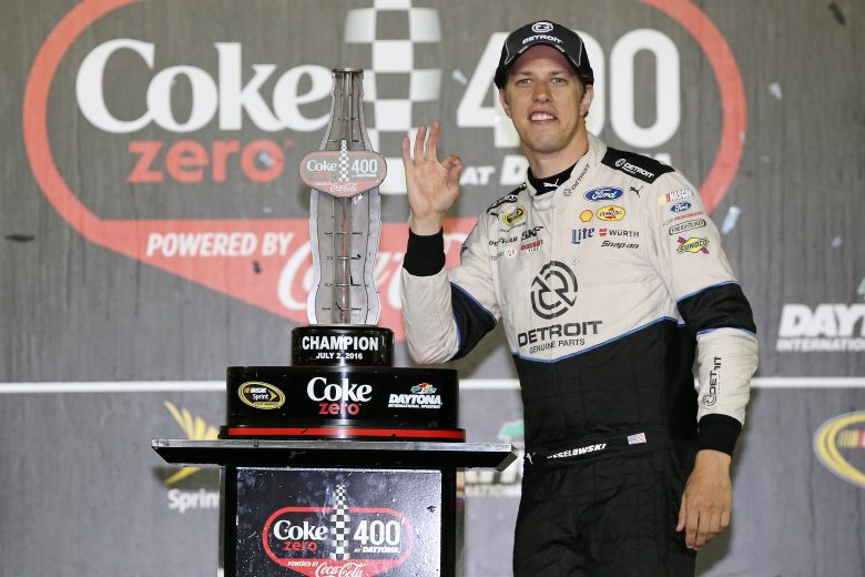 DAYTONA BEACH, FL - JULY 02:  Brad Keselowski, driver of the #2 Detroit Genuine Parts Ford, poses in Victory Lane after winning the NASCAR Sprint Cup Series Coke Zero 400 Powered By Coca-Cola at Daytona International Speedway on July 2, 2016 in Daytona Beach, Florida.  (Photo by Sean Gardner/NASCAR via Getty Images)