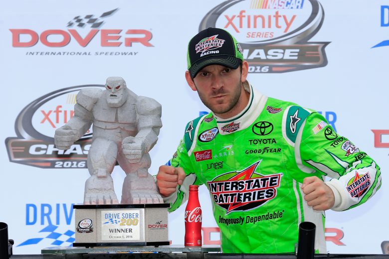 DOVER, DE - OCTOBER 02:  Daniel Suarez, driver of the #19 Interstate Batteries Toyota, celebrates with the trophy in Victory Lane after winning the NASCAR XFINITY Series Drive Sober 200 at Dover International Speedway on October 2, 2016 in Dover, Delaware.  (Photo by Chris Trotman/Getty Images) | Getty Images