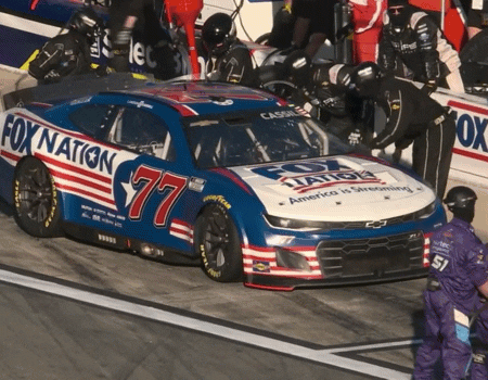 Being a pit crew member means you need some exceptional reflexes. Nice hop, No. 51 crew member.