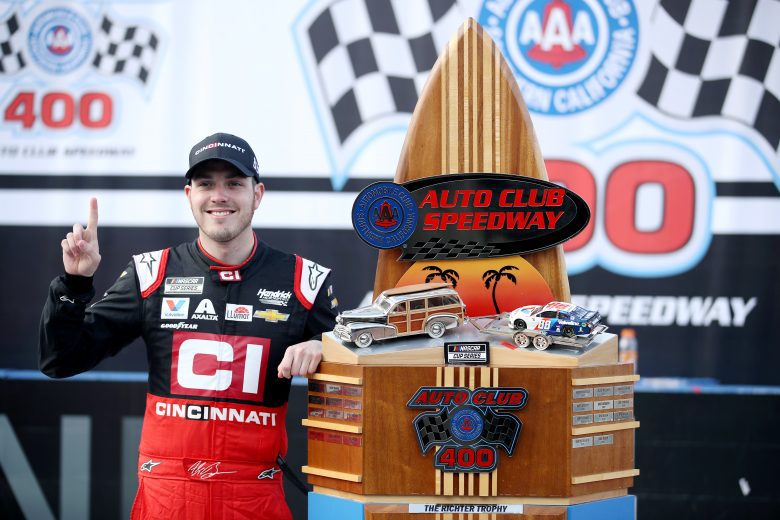 FONTANA, CALIFORNIA - MARCH 01: Alex Bowman, driver of the #88 Cincinnati Chevrolet, celebrates with the trophy in Victory Lane after winning the NASCAR Cup Series Auto Club 400 at Auto Club Speedway on March 01, 2020 in Fontana, California. (Photo by Katelyn Mulcahy/Getty Images) | Getty Images