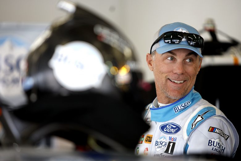 DAYTONA BEACH, FLORIDA - FEBRUARY 19: Kevin Harvick, driver of the #4 Busch Light #BUSCHRACETEAM Ford, waits in the garage area during practice for NASCAR Cup Series 64th Annual Daytona 500 at Daytona International Speedway on February 19, 2022 in Daytona Beach, Florida. (Photo by Sean Gardner/Getty Images) | Getty Images
