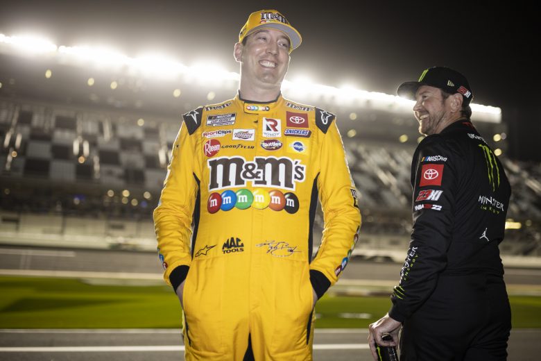 DAYTONA BEACH, FLORIDA - FEBRUARY 16: Kyle Busch, driver of the #18 M&M's Toyota, talks with Kurt Busch, driver of the #45 Monster Energy Toyota, on pit lane during qualifying for the NASCAR Cup Series 64th Annual Daytona 500 at Daytona International Speedway on February 16, 2022 in Daytona Beach, Florida. (Photo by James Gilbert/Getty Images) | Getty Images