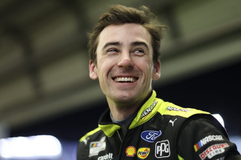 DAYTONA BEACH, FLORIDA - FEBRUARY 15: Ryan Blaney, driver of the #12 Menards/Blue DEF/PEAK Ford, looks on in the garage area during practice for the NASCAR Cup Series 64th Annual Daytona 500 at Daytona International Speedway on February 15, 2022 in Daytona Beach, Florida. (Photo by James Gilbert/Getty Images) | Getty Images