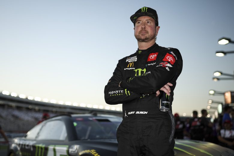 Kurt Busch stands on pit road at Charlotte Motor Speedway