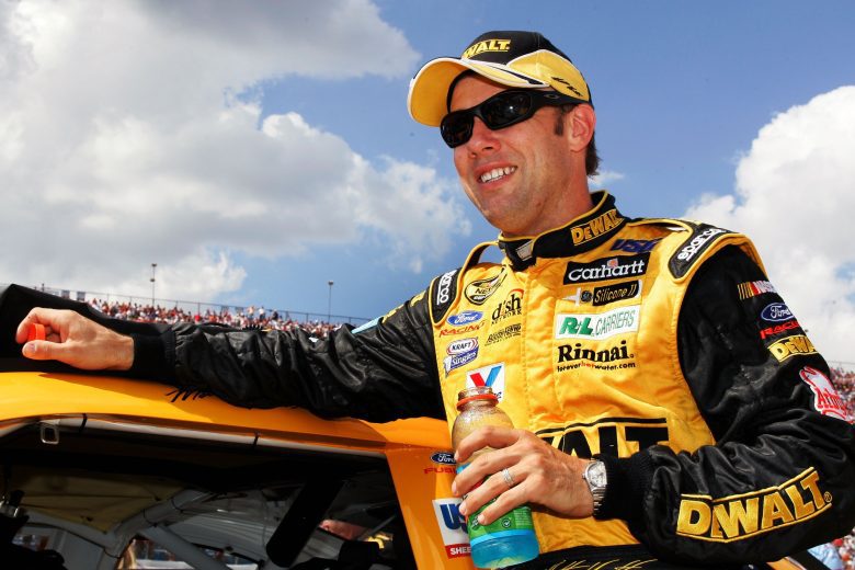 Matt Kenseth stands on pit road