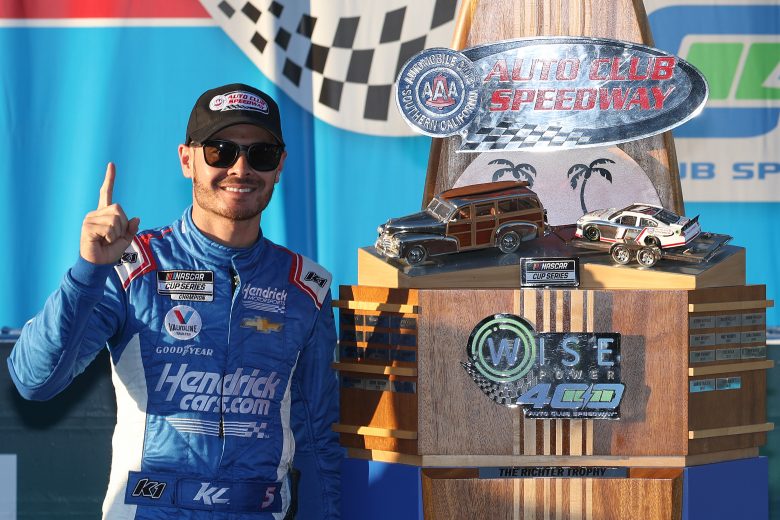 FONTANA, CALIFORNIA - FEBRUARY 27: Kyle Larson, driver of the #5 HendrickCars.com Chevrolet, celebrates in the Ruoff Mortgage victory lane after winning the NASCAR Cup Series Wise Power 400 at Auto Club Speedway on February 27, 2022 in Fontana, California. (Photo by James Gilbert/Getty Images) | Getty Images