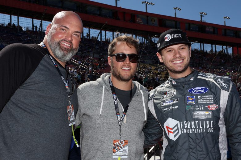 FONTANA, CALIFORNIA - FEBRUARY 27: Todd Gilliland, driver of the #38 Frontline Enterprises Inc. Ford, (C) poses for photos with Los Angeles Rams quarterback Matthew Stafford (R) and offensive tackle Andrew Whitworth (L) prior to the NASCAR Cup Series Wise Power 400 at Auto Club Speedway on February 27, 2022 in Fontana, California. (Photo by James Gilbert/Getty Images) | Getty Images