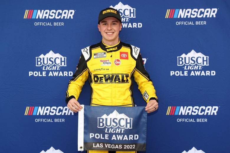 LAS VEGAS, NEVADA - MARCH 05: Christopher Bell, driver of the #20 DeWalt Toyota, poses for photos after winning the pole award during qualifying for the NASCAR Cup Series Pennzoil 400 at Las Vegas Motor Speedway on March 05, 2022 in Las Vegas, Nevada. (Photo by Meg Oliphant/Getty Images) | Getty Images