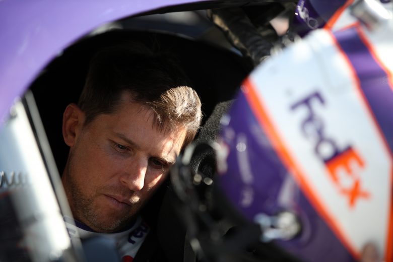 LAS VEGAS, NEVADA - MARCH 05: Denny Hamlin, driver of the #11 FedEx Freight Toyota, sits in his car during practice for NASCAR Cup Series Pennzoil 400 at Las Vegas Motor Speedway on March 05, 2022 in Las Vegas, Nevada. (Photo by Meg Oliphant/Getty Images) | Getty Images