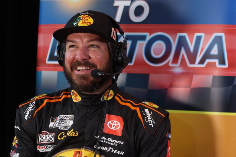DAYTONA BEACH, FLORIDA - FEBRUARY 16: Martin Truex Jr., driver of the #19 Bass Pro Shops Toyota, speaks to the media during the NASCAR Cup Series 64th Annual Daytona 500 Media Day at Daytona International Speedway on February 16, 2022 in Daytona Beach, Florida. (Photo by James Gilbert/Getty Images) | Getty Images
