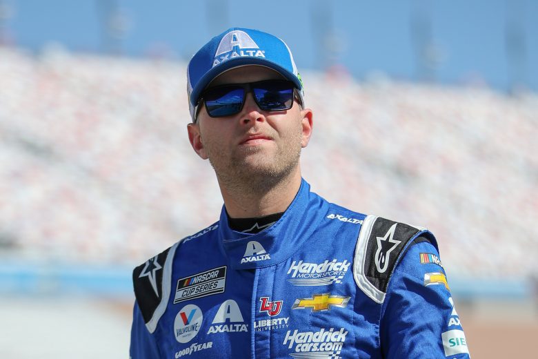 LAS VEGAS, NEVADA - MARCH 05: William Byron Jr., driver of the #24 Axalta Chevrolet, walks the grid during practice for NASCAR Cup Series Pennzoil 400 at Las Vegas Motor Speedway on March 05, 2022 in Las Vegas, Nevada. (Photo by Meg Oliphant/Getty Images) | Getty Images
