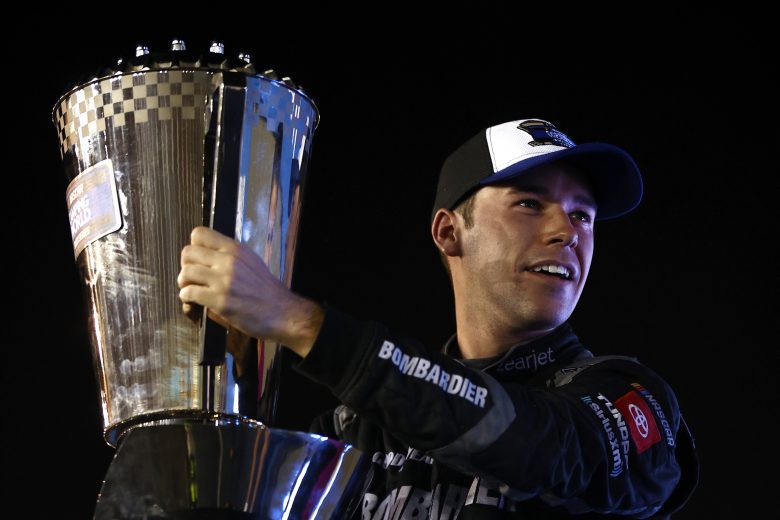 AVONDALE, ARIZONA - NOVEMBER 05: Ben Rhodes, driver of the #99 Bombardier LearJet 75 Toyota, celebrates in victory lane after winning the 2021 NASCAR Camping World Truck Series Championship at Phoenix Raceway on November 05, 2021 in Avondale, Arizona. (Photo by Jared C. Tilton/Getty Images) | Getty Images