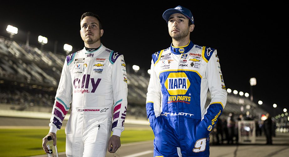 DAYTONA BEACH, FLORIDA - FEBRUARY 16: Chase Elliott, driver of the #9 NAPA Auto Parts Chevrolet, and Alex Bowman, driver of the #48 Ally Chevrolet, walk on pit lane during qualifying for the NASCAR Cup Series 64th Annual Daytona 500 at Daytona International Speedway on February 16, 2022 in Daytona Beach, Florida. (Photo by James Gilbert/Getty Images) | Getty Images