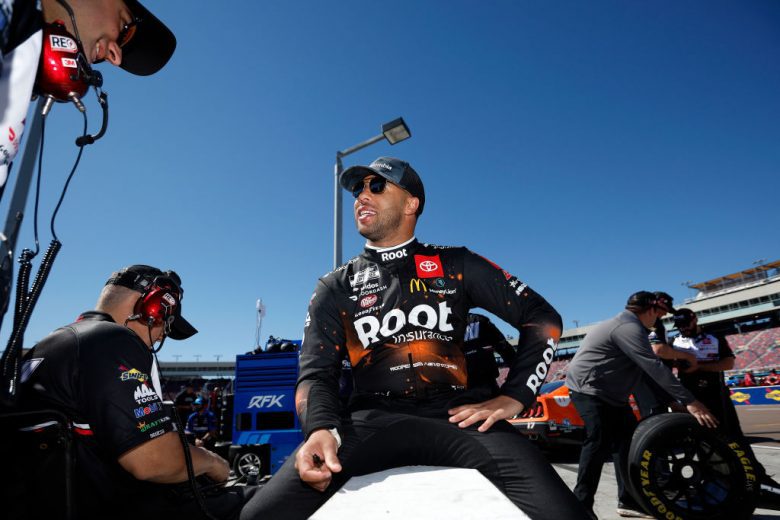 AVONDALE, ARIZONA - MARCH 12: Bubba Wallace, driver of the #23 ROOT Insurance Toyota, speaks with crew members on the grid during practice for for the Ruoff Mortgage 500 at Phoenix Raceway on March 12, 2022 in Avondale, Arizona. (Photo by Sean Gardner/Getty Images) | Getty Images