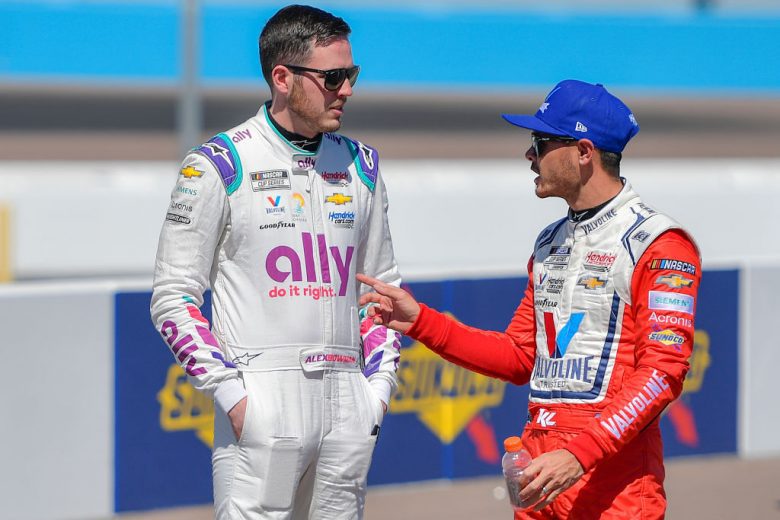 AVONDALE, ARIZONA - MARCH 12: Alex Bowman, driver of the #48 Ally/Best Friends Chevrolet, (L) and Kyle Larson, driver of the #5 Valvoline Chevrolet, talk on the grid during qualifying for the Ruoff Mortgage 500 at Phoenix Raceway on March 12, 2022 in Avondale, Arizona. (Photo by Logan Riely/Getty Images) | Getty Images