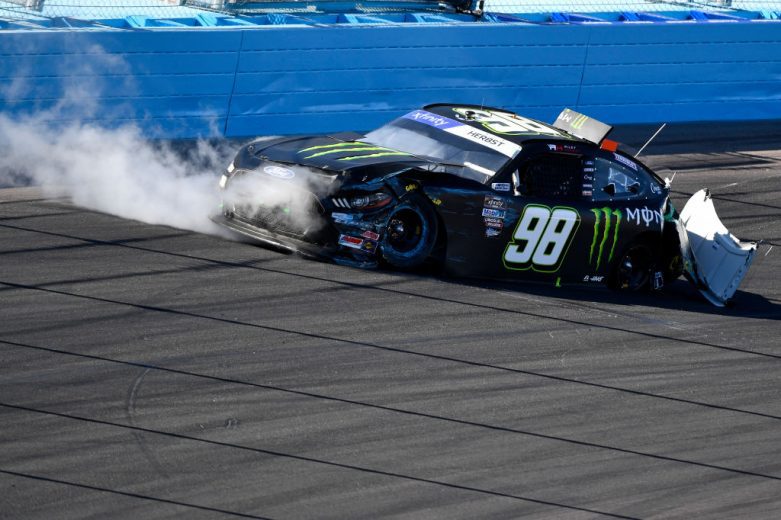 AVONDALE, ARIZONA - MARCH 12: Riley Herbst, driver of the #98 Monster Energy Ford, spins after an on-track incident during the NASCAR Xfinity Series United Rentals 200 at Phoenix Raceway on March 12, 2022 in Avondale, Arizona. (Photo by Logan Riely/Getty Images) | Getty Images