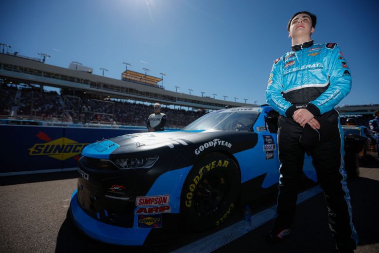 AVONDALE, ARIZONA - MARCH 12: Sam Mayer, driver of the #1 Accelerate Pros Talent Chevrolet, stands on the grid during pre-race ceremonies prior to the NASCAR Xfinity Series United Rentals 200 at Phoenix Raceway on March 12, 2022 in Avondale, Arizona. (Photo by Sean Gardner/Getty Images) | Getty Images