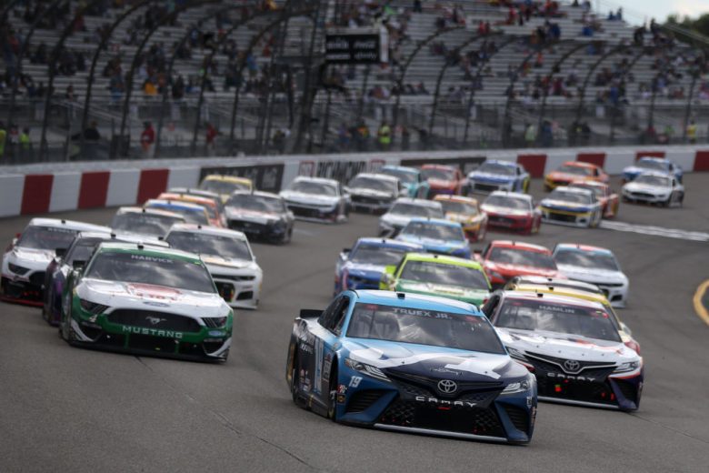 RICHMOND, VIRGINIA - APRIL 18: Martin Truex Jr., driver of the #19 Auto-Owners Insurance Toyota, leads the field during the NASCAR Cup Series Toyota Owners 400 at Richmond Raceway on April 18, 2021 in Richmond, Virginia. (Photo by Brian Lawdermilk/Getty Images) | Getty Images