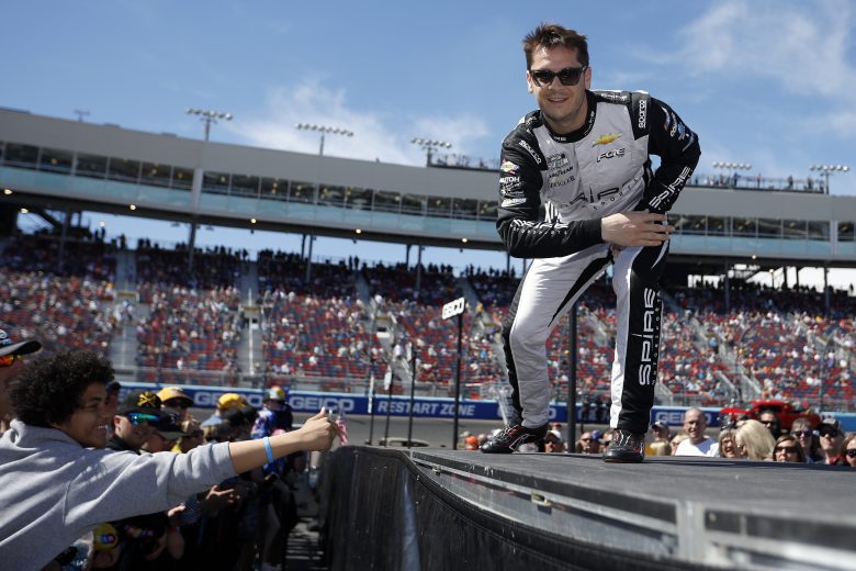 AVONDALE, ARIZONA - MARCH 13: Landon Cassill, driver of the #77 Voyager: Crypto for All Chevrolet, greets fans during the driver intros prior to the Ruoff Mortgage 500 during at Phoenix Raceway on March 13, 2022 in Avondale, Arizona. (Photo by Sean Gardner/Getty Images) | Getty Images
