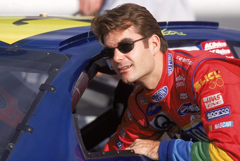 21 Nov 1999: Jeff Gordon reaches into his car during the NAPA 500, part of the NASCAR Winston Cup Series, at the Atlanta Motor Speedway in Hampton, Georgia. Mandatory Credit: David Taylor /Allsport