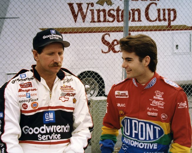 1990s: Dale Earnhardt with Goodwrench and Jeff Gordon with DuPont Automotive Finishes share race strategies. (Photo by ISC Archives/CQ-Roll Call Group via Getty Images)
