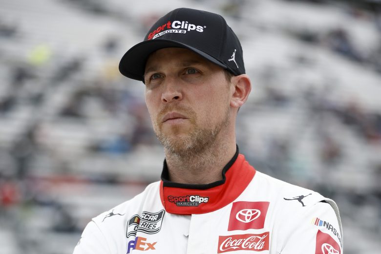 MARTINSVILLE, VIRGINIA - APRIL 08: Denny Hamlin, driver of the #11 Sport Clips Haircuts Toyota, looks on during qualifying for the NASCAR Cup Series Blue-Emu Maximum Pain Relief 400 at Martinsville Speedway on April 08, 2022 in Martinsville, Virginia. (Photo by Jared C. Tilton/Getty Images) | Getty Images
