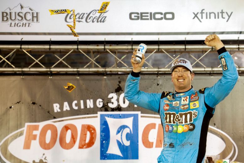 BRISTOL, TENNESSEE - APRIL 17: Kyle Busch, driver of the #18 Mars Crunchy Cookie Toyota, celebrates in victory lane after winning the NASCAR Cup Series Food City Dirt Race at Bristol Motor Speedway on April 17, 2022 in Bristol, Tennessee. (Photo by Chris Graythen/Getty Images) | Getty Images