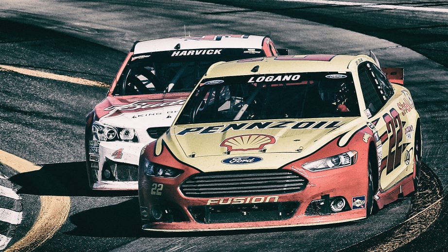 WATKINS GLEN, NY - AUGUST 09: (EDITOR'S NOTE: Image was processed using digital filters.) Joey Logano, driver of the #22 Shell Pennzoil Ford, passes Kevin Harvick, driver of the #4 Budweiser/Jimmy John's Chevrolet, on the final lap to win the NASCAR Sprint Cup Series Cheez-It 355 at the Glen at Watkins Glen International on August 9, 2015 in Watkins Glen, New York. (Photo by Chris Graythen/Getty Images) | Getty Images