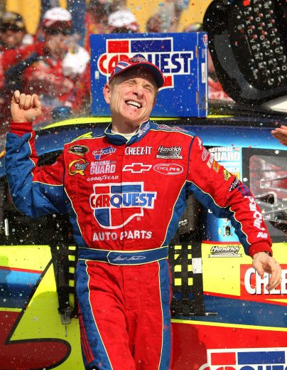 BROOKLYN, MI - JUNE 14: Mark Martin, driver of the #5 CARQUEST/Kellogg's Chevrolet, celebrates in victory lane after winning the NASCAR Sprint Cup Series LifeLock 400 at Michigan International Speedway on June 14, 2009 in Brooklyn, Michigan. (Photo by Ezra Shaw/Getty Images) | Getty Images